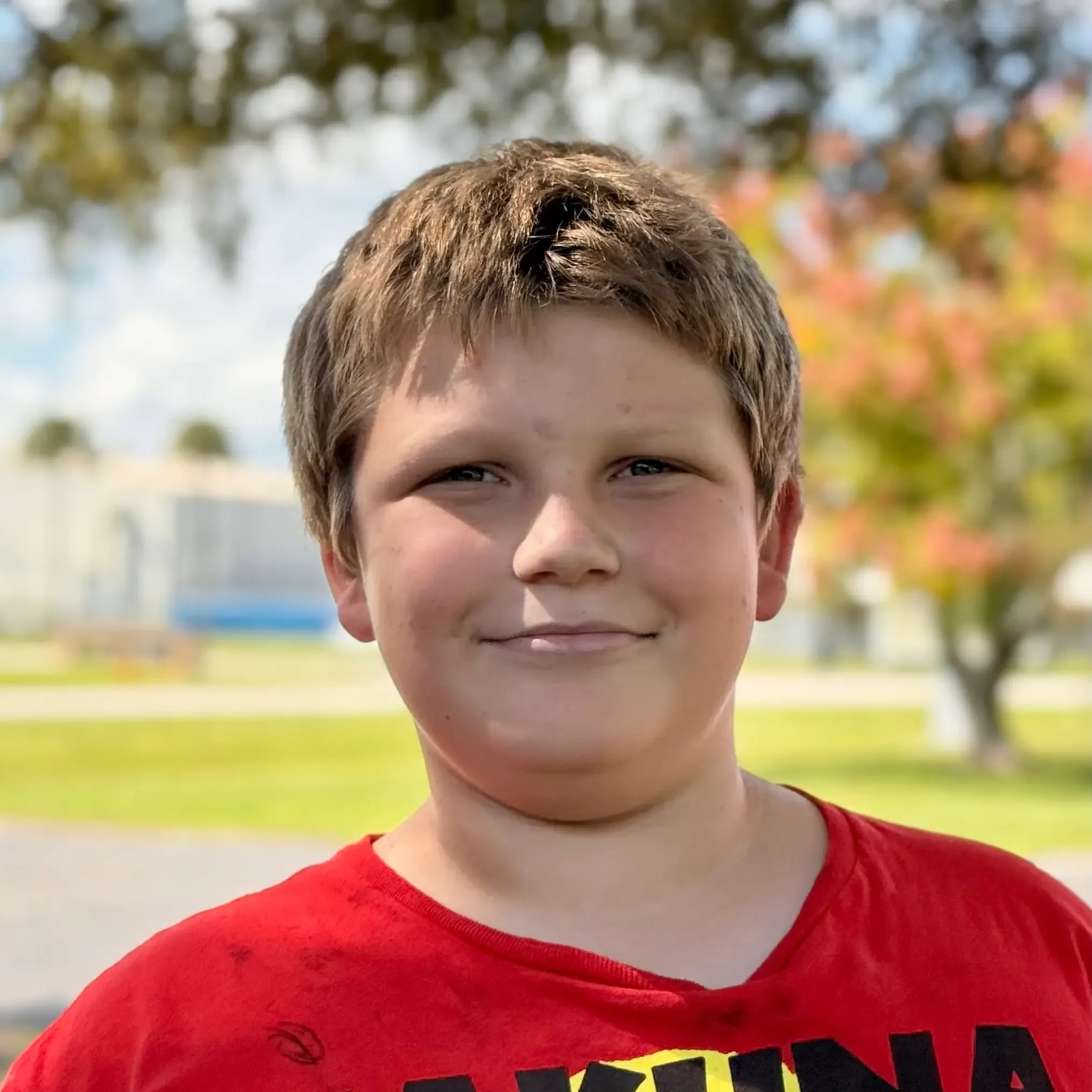 Student smiling at camera