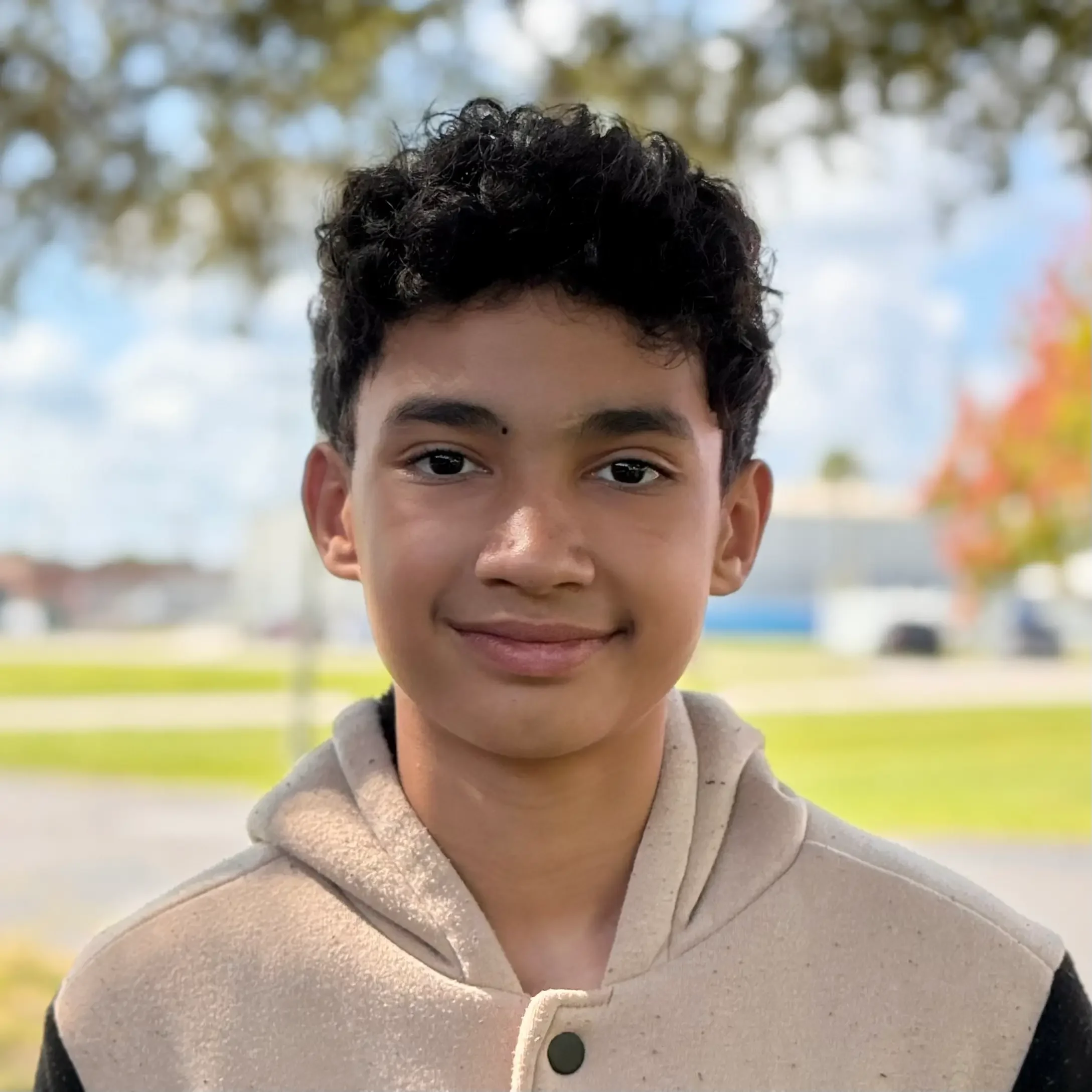 Student smiling at camera